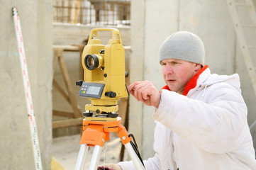 surveyor worker at construction site