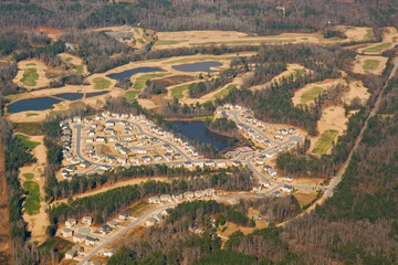 Fototapeta na wymiar Aerial view of a golf course and housing development
