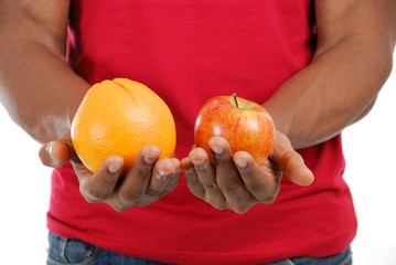 African american man holding fruits