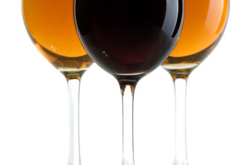 Glasses with white and red wine on a white background