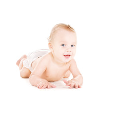 laying baby boy in diaper