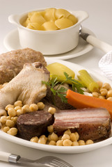 Spanish cuisine. Soup with meat of the pot.