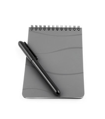 Spiral bound note pad and pen isolated on white