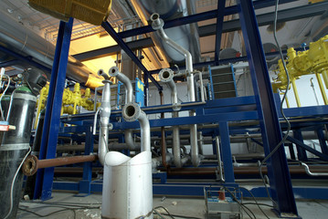 Pipes, tubes, machinery and steam turbine at a power plant