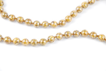 Pearl necklace on white
