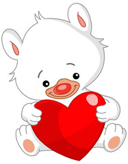 White teddy bear holding a big heart