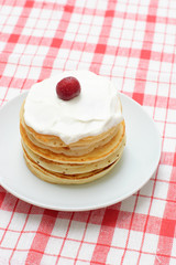 pancakes with cream and cherries