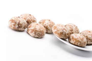 Pile of honey-cakes over white background