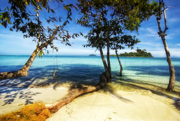 Tropical beach under blue sky. Thailand