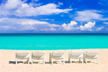 Chairs on tropical beach