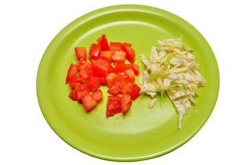 Sliced tomatoes on a plate top view