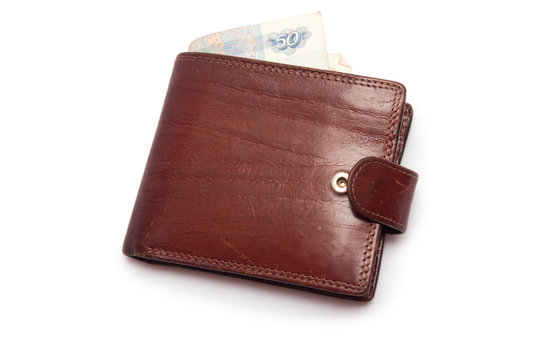 Closed wallet with money a top view