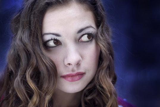 Portrait of the young beautiful girl at night