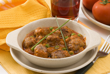 Spanish cuisine. Meatballs in tomato sauce.