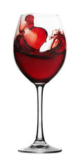 Red wine leaping and splashing from a wine glass on white backgr