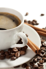 cup of coffee and roasted beans isolated