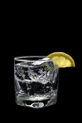 Club Soda or Gin / Vodka Tonic on a black background
