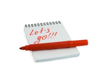 Red marker and notebook isolated over white