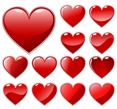 Set of red shiny hearts - isolated on white
