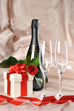 gift in box and champagne