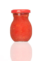 Glass jar of tomato paste