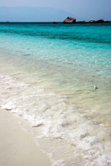 Tropical beach under blue sky. Thailand