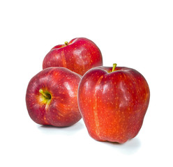 Fresh ripe red delicious apples on white background