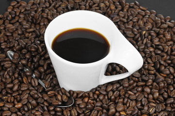 coffee beans and a cup of coffee