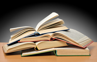 Pile of books isolated on grey background