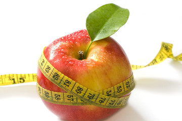 Fresh apple and measute tape