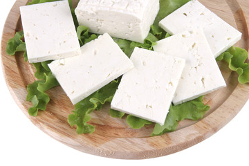 sliced white cheese on plate