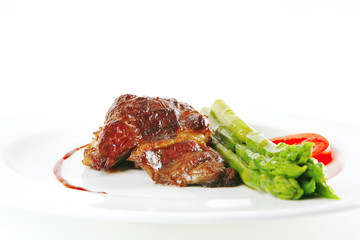 beef meat served on white