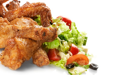 Chicken legs with fresh vegetables