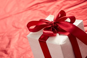 Beautiful gift box on the red background