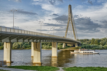 Swietokrzyski bridge on Vistula river in Warsaw. HDR technique.