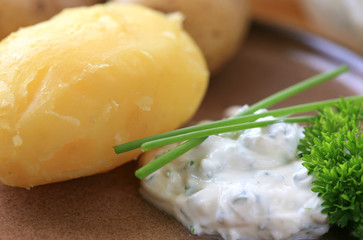 Baked potatoes with sour cream