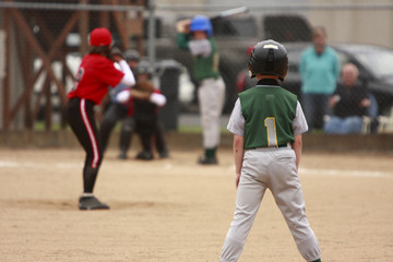 batter about to hit a pitch during a baseball game