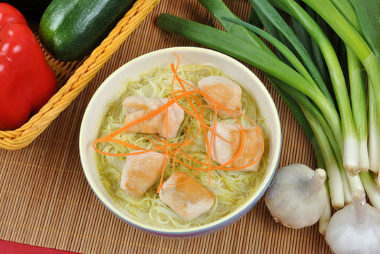 asian style noodle chicken soup with carrot