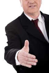 Business man gives shake hand