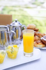 Breakfast with orange juice coffe tea milk