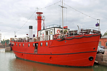 Red ship at the marina dock in helsinki, finland