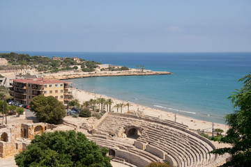 Ruins of an old amphitheatre on seacoast. Tarragona. Spain