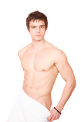 Fototapeta premium Young, handsome man overwraped by towel