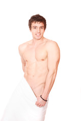 Fototapeta premium Young, handsome man overwraped by towel