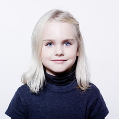 Naklejka premium studio portrait of a caucasian cute litle girl