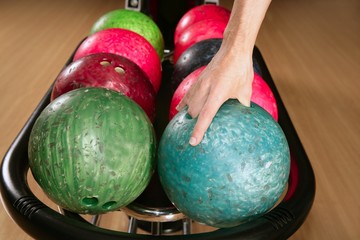 Bowling ball in player man hand
