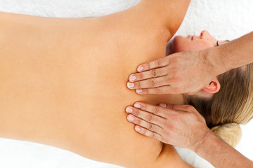 Fototapeta na wymiar Relaxed woman enjoying a massage
