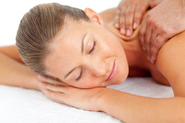 Fototapeta na wymiar Portrait of asleep woman enjoying a massage