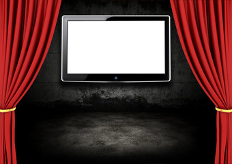 Fototapeta premium Red Stage Theater Drapes and LCD screen in a dark room