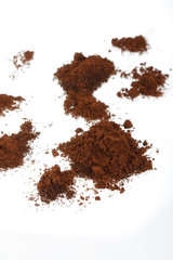 Coffee grains on the white.